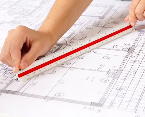 scale ruler on blueprints